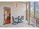 Covered porch featuring seating area, views, and natural light at 11 Swallow Tail Ct, Pittsboro, NC 27312
