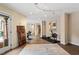 Large recreation room with exercise equipment, stylish decor, and ample space for activities at 11 Swallow Tail Ct, Pittsboro, NC 27312