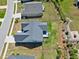 Aerial view showcasing the property's roof and spacious backyard with fence, set in a suburban neighborhood at 1165 Saint Cloud Loop, Apex, NC 27523