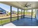View from the covered patio highlighting the spacious, covered area, and ceiling fan at 1165 Saint Cloud Loop, Apex, NC 27523