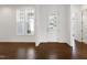 Entryway featuring a window and glass-paneled door, providing natural light and a welcoming entrance at 1165 Saint Cloud Loop, Apex, NC 27523