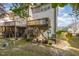 Backyard view highlighting the wooden deck and concrete patio area at 117 Gallent Hedge Trl, Apex, NC 27539