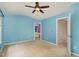 Bedroom with blue walls and a ceiling fan at 117 Gallent Hedge Trl, Apex, NC 27539