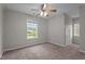 Bedroom with neutral walls, carpet floors, and ceiling fan at 120 Stillmeadow Dr, Louisburg, NC 27549