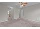 Bedroom with carpet, ceiling fan, and attached bathroom at 120 Stillmeadow Dr, Louisburg, NC 27549