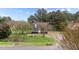 Attractive home with a well-maintained lawn, mature trees, and a classic design at 120 Stillmeadow Dr, Louisburg, NC 27549