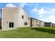 Exterior of a two-story home with sliding glass doors to the backyard at 121 Pisgah St, Sanford, NC 27330