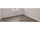 The room shows new modern flooring with fresh paint at 121 Pisgah St, Sanford, NC 27330