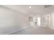A versatile bonus room with plush carpeting and ample space, ideal for recreation or relaxation at 124 Pisgah St, Sanford, NC 27330