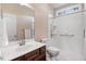 Bathroom featuring a vanity with a sink, toilet, and a shower with glass doors at 13 Parkers Pointe Dr, Benson, NC 27504