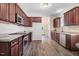 The kitchen features stainless appliances, ample counter space, and stylish cabinetry at 13 Parkers Pointe Dr, Benson, NC 27504