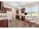 Eat-in kitchen features stainless steel appliances and granite counters with bright natural light at 13 Parkers Pointe Dr, Benson, NC 27504