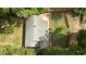 Overhead shot of home and backyard featuring a patio and landscaped areas at 1307 Crabapple Ln, Raleigh, NC 27607