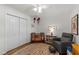 Cozy Bedroom featuring a modern rocking chair, whimsical decor, and ample storage space at 1307 Crabapple Ln, Raleigh, NC 27607