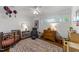Charming Bedroom with a wooden crib, rocking chair, and a colorful rug at 1307 Crabapple Ln, Raleigh, NC 27607