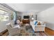 Comfortable living room with large windows and tasteful decor at 1307 Crabapple Ln, Raleigh, NC 27607