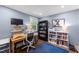 Bright office with desk, bookshelves, and window offering natural light at 1307 Crabapple Ln, Raleigh, NC 27607