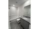Well-lit bathroom featuring a granite-topped vanity, tile floor, and shower-tub combination at 14 Cricket Hill Way, Benson, NC 27504