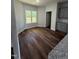 Cozy breakfast nook featuring hardwood floors and large windows at 14 Cricket Hill Way, Benson, NC 27504