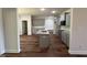 Modern kitchen with granite countertops, gray cabinetry, and stainless steel appliances at 14 Cricket Hill Way, Benson, NC 27504