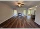 Bright living room featuring hardwood floors and a classic fireplace at 14 Cricket Hill Way, Benson, NC 27504