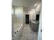 Elegant main bathroom featuring dual sinks, soaking tub, walk-in shower, and walk-in closet at 14 Cricket Hill Way, Benson, NC 27504