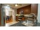 Well-lit kitchen features stainless steel appliances, granite countertops, and hardwood floors at 1415 Quarter Pt, Raleigh, NC 27615