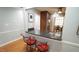 Kitchen bar with granite counters and a view into the dining area at 1415 Quarter Pt, Raleigh, NC 27615