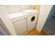 Convenient laundry area equipped with a washer and dryer, maximizing home efficiency at 1415 Quarter Pt, Raleigh, NC 27615