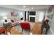 Comfortable living room with hardwood floors, fireplace, and modern decor at 1415 Quarter Pt, Raleigh, NC 27615