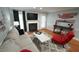 Cozy living room with a fireplace, comfortable seating, and stylish decor at 1415 Quarter Pt, Raleigh, NC 27615
