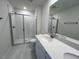 Bathroom featuring tile flooring, glass enclosed shower, and a sink vanity at 152 Parker Ln, Mebane, NC 27302