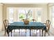 Bright dining room with a large window at 1556 Pleasants Rd, Wendell, NC 27591