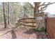 Charming entrance with stone columns, wooden fence, and the name 'Arden Farm' displayed at 1556 Pleasants Rd, Wendell, NC 27591