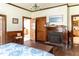 Cozy living room featuring a fireplace, hardwood floors, and natural light at 1556 Pleasants Rd, Wendell, NC 27591