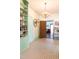 Charming interior view showcasing a chandelier and custom built-in bookshelves at 1556 Pleasants Rd, Wendell, NC 27591