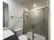 Bathroom featuring a tiled shower with glass door at 158 Parker Ln, Mebane, NC 27302