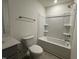 Bright bathroom featuring a shower and tub combination and a single sink vanity at 158 Parker Ln, Mebane, NC 27302