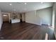 Spacious open-concept living and kitchen area with hardwood floors at 158 Parker Ln, Mebane, NC 27302