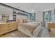 Stylish main bedroom boasts a king-size bed, wood furniture, patterned curtains, and plenty of natural light at 1600 S Wade Ave, Garner, NC 27529