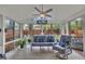Bright sunroom with plenty of seating, natural light, a ceiling fan, and views of the outdoors at 1600 S Wade Ave, Garner, NC 27529