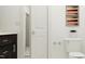 Well-lit bathroom featuring modern toilet, stylish decor, and a cabinet for storage at 1653 Goldfinch Perch Ln, Knightdale, NC 27545