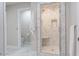 Modern bathroom with a tiled shower stall and a glimpse of the toilet area at 1705 Lord Ashley Dr, Sanford, NC 27330