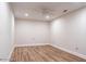 An empty bedroom with laminated floor, ceiling fan, and recessed lighting at 1705 Lord Ashley Dr, Sanford, NC 27330