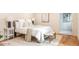 Cozy bedroom features hardwood floors, natural light, and neutral paint colors at 1705 Lord Ashley Dr, Sanford, NC 27330
