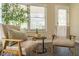 Cozy sitting area with comfortable chairs, natural light, and views of the outdoors at 1705 Lord Ashley Dr, Sanford, NC 27330