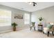 Bright bedroom with neutral carpet featuring natural light and seating at 1817 Heisser Ln, Fuquay Varina, NC 27526