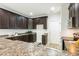 Kitchen features stainless steel appliances, ample cabinetry, and laminate countertops at 1817 Heisser Ln, Fuquay Varina, NC 27526