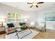Bright living room with modern furniture, stylish decor, and ample natural light at 1817 Heisser Ln, Fuquay Varina, NC 27526