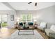 Cozy living room with large window, decorative lamps, and stylish accent furniture at 1817 Heisser Ln, Fuquay Varina, NC 27526